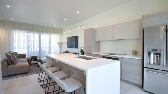 a kitchen with a refrigerator freezer sitting next to a counter